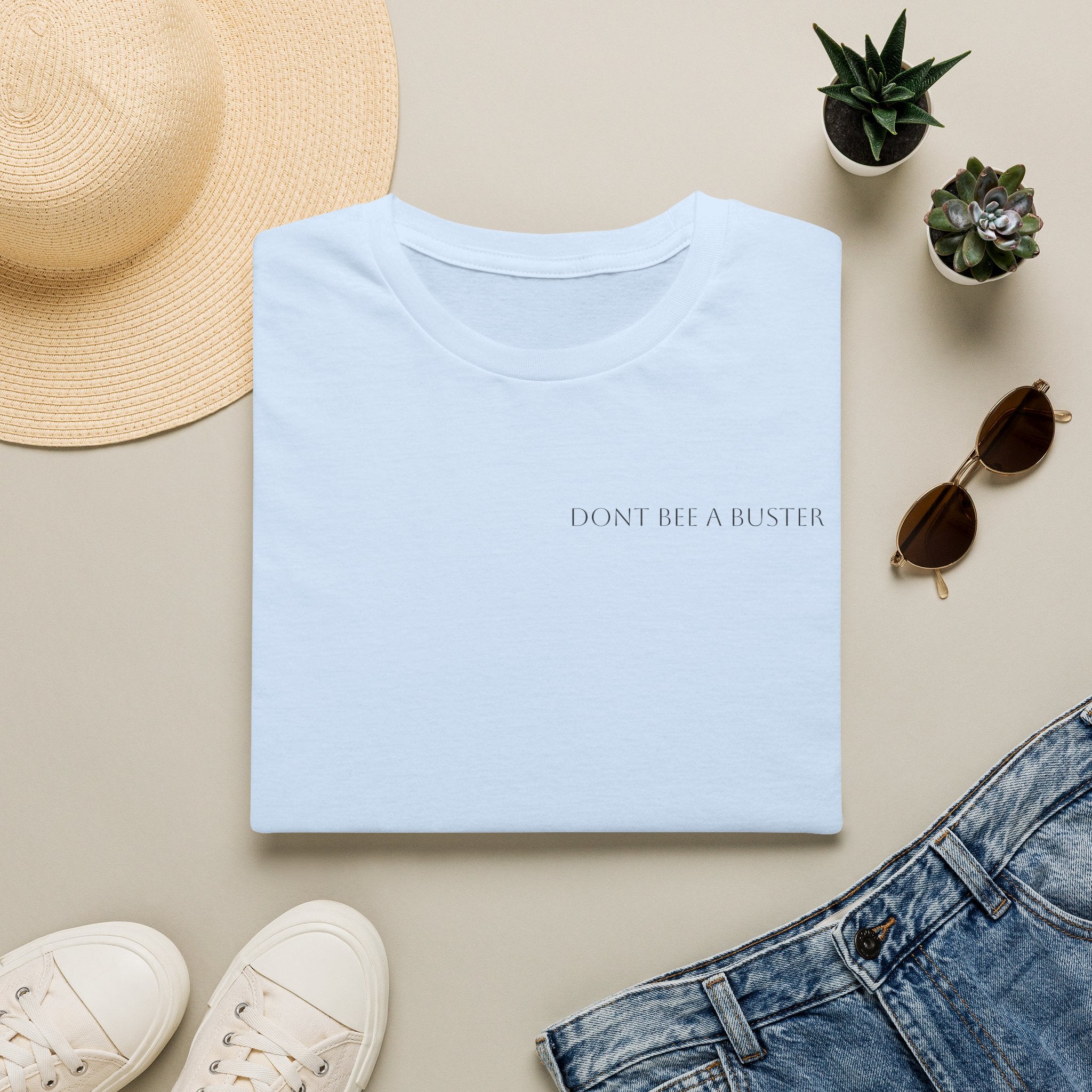 Minimal 'Don't Be A Buster' Relaxed T-Shirt — Casual Everyday Tee with Subtle Text
