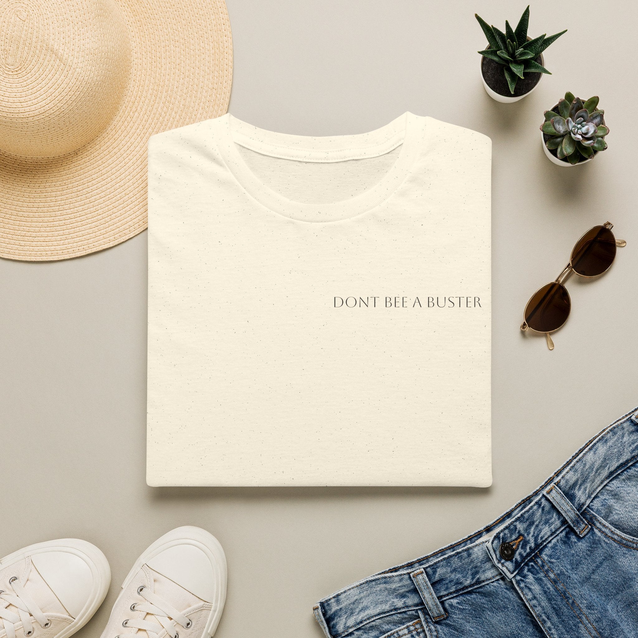 Minimal 'Don't Be A Buster' Relaxed T-Shirt — Casual Everyday Tee with Subtle Text
