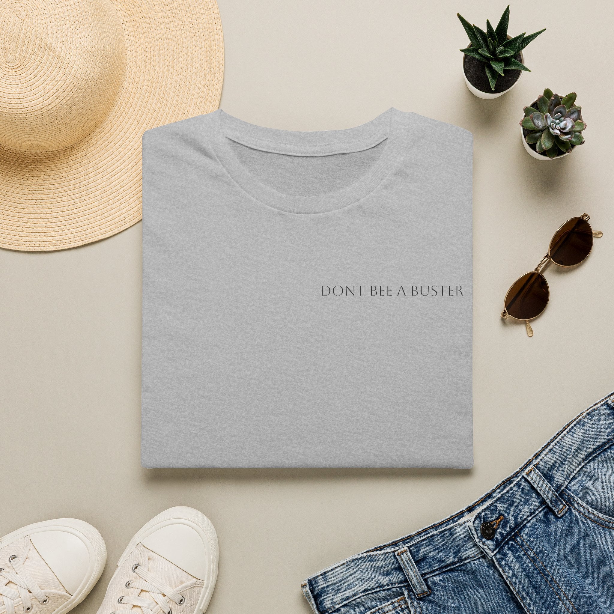 Minimal 'Don't Be A Buster' Relaxed T-Shirt — Casual Everyday Tee with Subtle Text